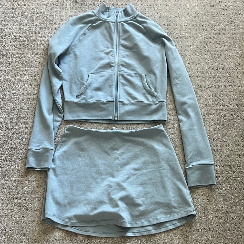 SKIMS Outdoor track jacket and skort set